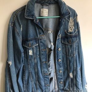 Denim jacket with chain detail